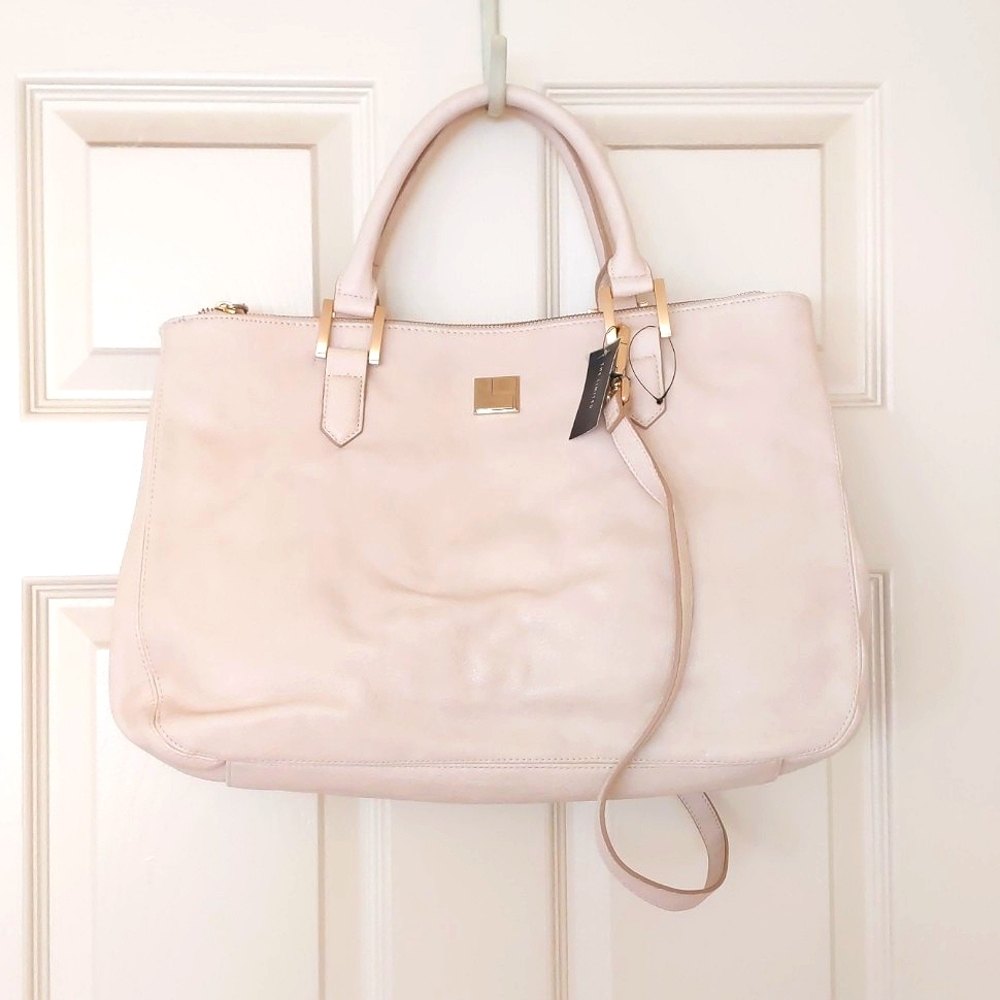 NWT. The Limited Crossbody/Shoulder/Laptop bag with three layers
